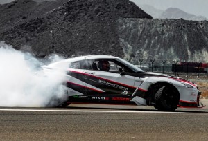 Dubai, UAE - Nissan has set the GUINNESS WORLD RECORDS title for the fastest ever drift. The record was broken with a speed of 304.96 km/hr and 30 degrees angle using a specially-tuned MY16 Nissan GT-R. Masato Kawabata, the Japanese drift champion and title holder for the Japanese drifting series, clinched the top spot from former record holder Jakub Przygo ski of Poland. The record was set during a special event that took place at Fujairah International Airport, UAE. The record-breaking Nissan GT-R was developed with the support and coordination of Nismo specialists. It was tuned to 1380 HP in order to set the record, and adapted so all the power went to the rear wheels. The GT-R was prepared by GReddy Trust and tested extensively at JapanÕs Fuji Speedway facility with Kawabata at the wheel. The car was set up for agility while maintaining stability and confidence-inspiring handling characteristics - essential when performing such challenging feats. "Once again, Nissan has broken a GUINNESS WORLD RECORDS title and has made international history for the fifth time in the Middle East," said Samir Cherfan, Managing Director of Nissan Middle East. "The Nissan GT-R is one of the worldÕs most iconic supercars, proving time and again the incredible breadth of its capabilities, and has clearly demonstrated its performance leadership by beating the best drift cars out there. The fact that this achievement was set here in the UAE makes it even more special for our region. Setting this incredibly difficult world record was a clear demonstration of the excitement we are bringing to the Middle East with the Nismo brand."